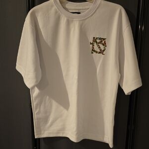 White Graphic Tee with Floral Design